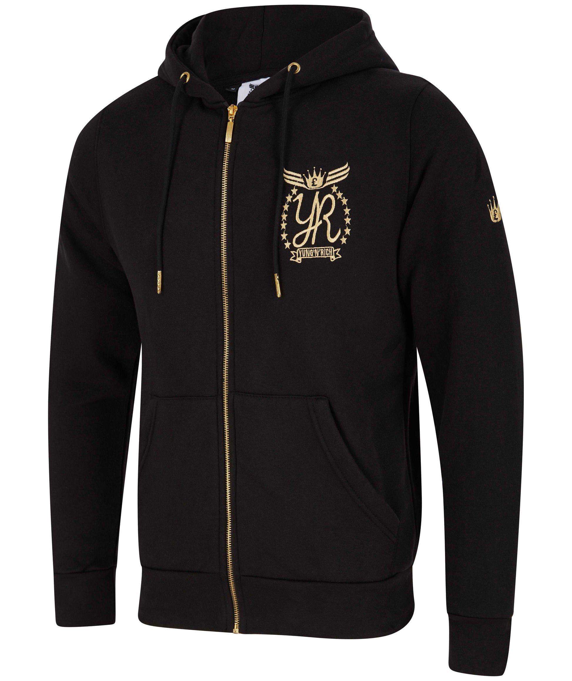 A close-up view of a YUNG'N'RICH black hoodie featuring a gold zip and detailed gold embroidery of the brand's logo on the chest. The logo showcases stylized 'YR' initials, encased within an ornate design with stars, wings, and a crown, representing the brand's fusion of streetwear with regal elements. The hoodie's design is refined yet bold, targeting the upscale urban fashion market.
