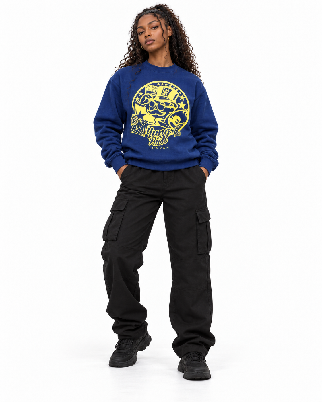 YUNG'N'RICH navy blue women's crewneck jumper with yellow graphic on female model, alternative front fashion pose