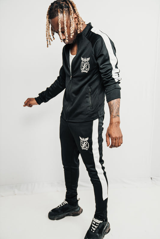 "YUNG'N'RICH Men's Funnel Neck Contrast Panel Stripe Tracksuit in black and white, featuring a unique funnel neck design, bold contrast panel stripes and embroidered Yung'n'Rich branding. Perfect for everyday wear and travel, available in unisex Regular size type"