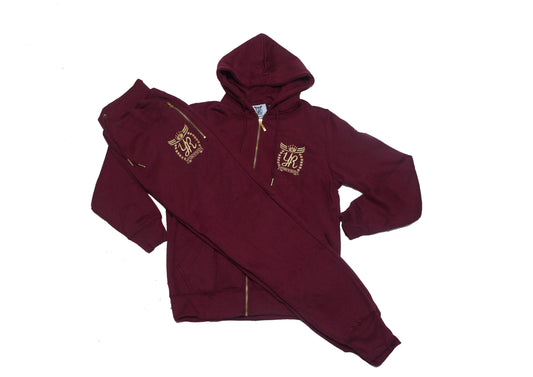 Yung'n'Rich burgundy tracksuit with gold logo and zipper accents for women's streetwear collection.