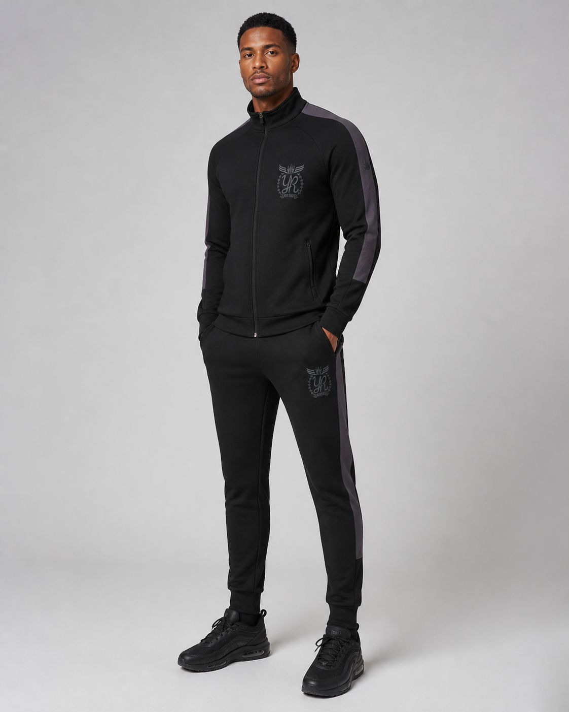 YUNG'N'RICH Men's Funnel Neck Tracksuit in black and grey on model