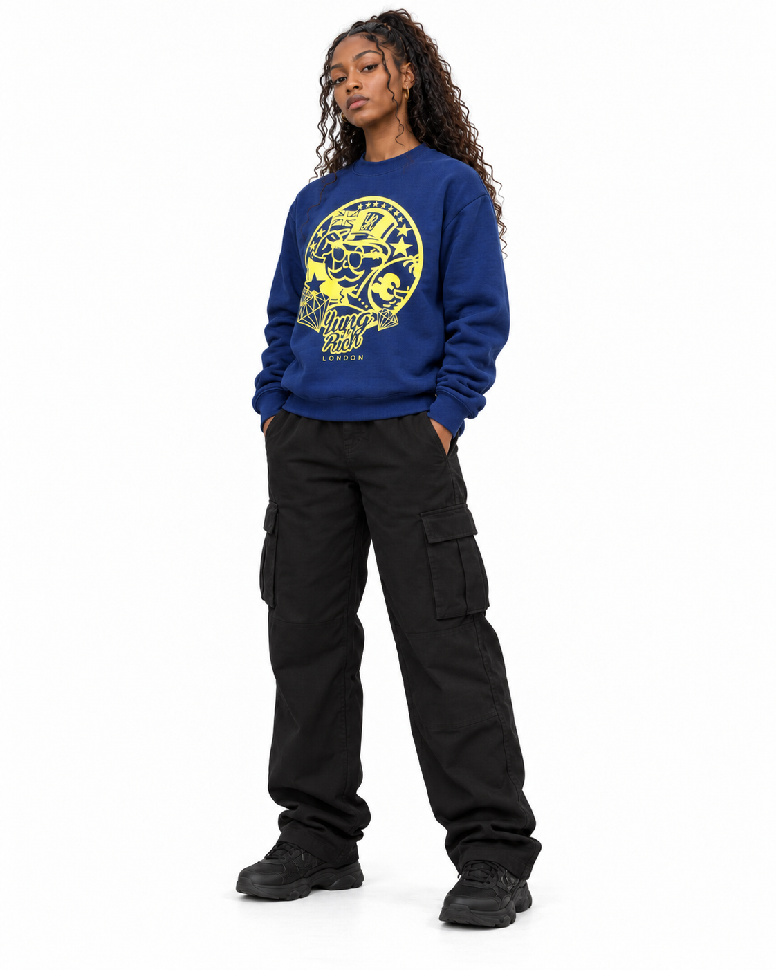 YUNG'N'RICH navy blue women's crewneck jumper with yellow graphic on female model, three-quarter view